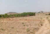 AMAC C of O LAND IS AVAILABLE FOR SALE IN AIRPORT ROAD ABUJA