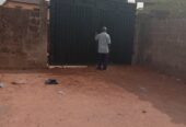 A Standard full plot of land with a demolishable structure and a temporal structure been used for school In a strategic location