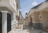 Tastefully built 4 bedroom duplex on an 800 square meters plot, with a 2 bedroom bq, borehole, water tank, security house, less than 30 minutes drive to the airport. buy and move in.