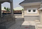 Tastefully built 4 bedroom duplex on an 800 square meters plot, with a 2 bedroom bq, borehole, water tank, security house, less than 30 minutes drive to the airport. buy and move in.