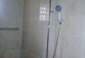 A 20 Room Hotel/Guest With Large Sparse Of Land For Parking