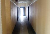 A 20 Room Hotel/Guest With Large Sparse Of Land For Parking