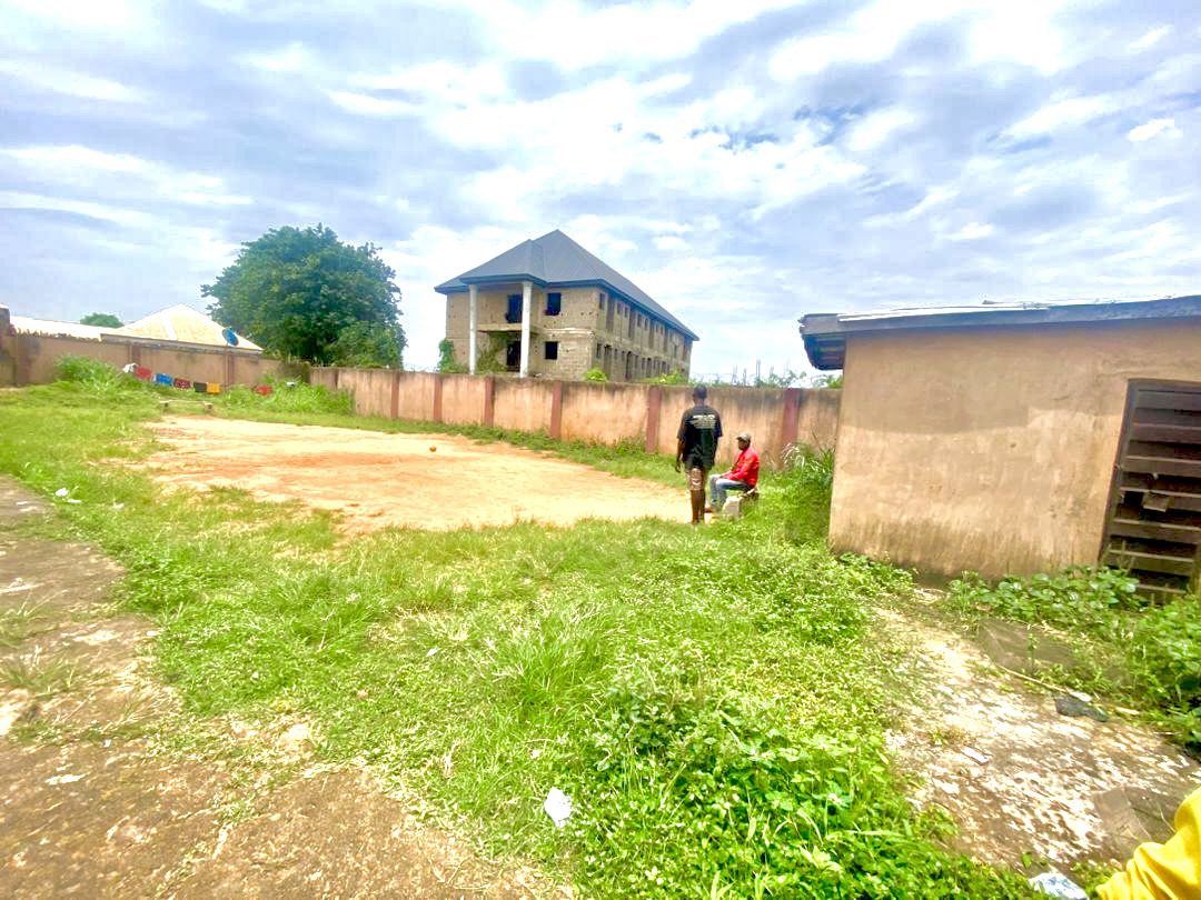 Twenty Four ( 24 ) Rooms Self-Contained Lodge in a plot of land, including an extra Plot of land fenced with gate together with the building available for sell at Igbariam Awka Anambra State