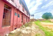 Twenty Four ( 24 ) Rooms Self-Contained Lodge in a plot of land, including an extra Plot of land fenced with gate together with the building available for sell at Igbariam Awka Anambra State