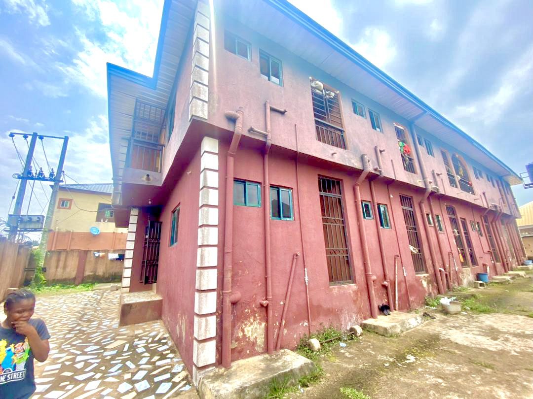 Twenty Four ( 24 ) Rooms Self-Contained Lodge in a plot of land, including an extra Plot of land fenced with gate together with the building available for sell at Igbariam Awka Anambra State