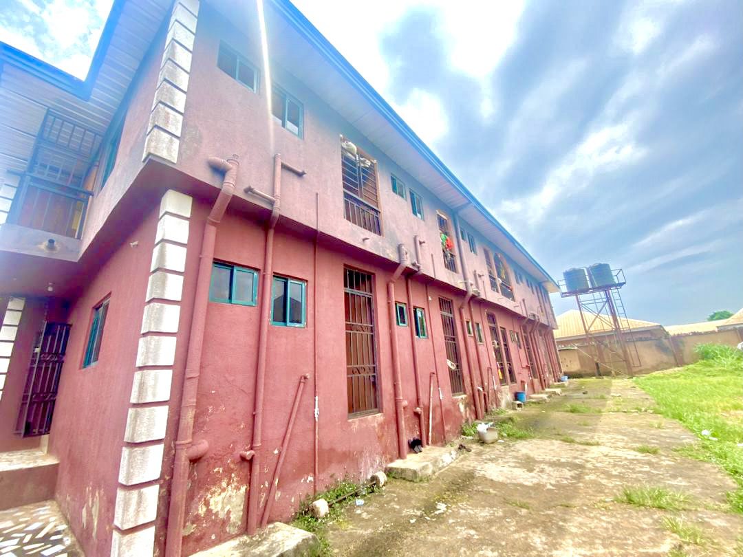 Twenty Four ( 24 ) Rooms Self-Contained Lodge in a plot of land, including an extra Plot of land fenced with gate together with the building available for sell at Igbariam Awka Anambra State