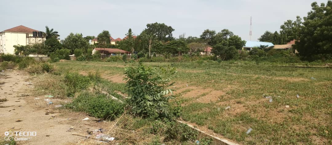 1.5hectares of bare land and a building (open space supermarket) inside Games Village, Abuja available for immediate sale.