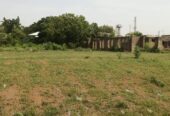 1.5hectares of bare land and a building (open space supermarket) inside Games Village, Abuja available for immediate sale.