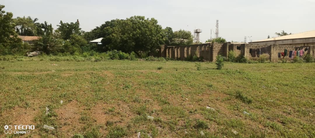 1.5hectares of bare land and a building (open space supermarket) inside Games Village, Abuja available for immediate sale.