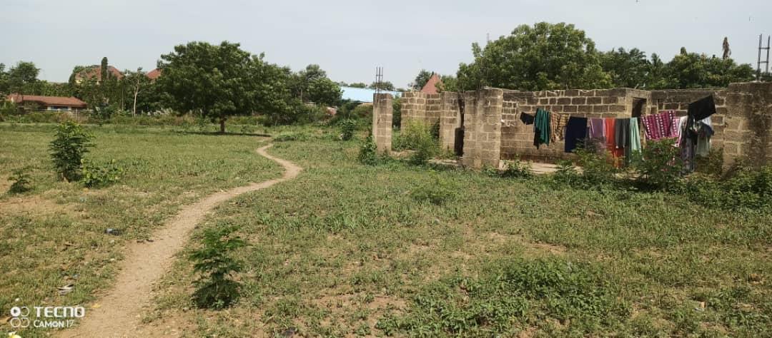 1.5hectares of bare land and a building (open space supermarket) inside Games Village, Abuja available for immediate sale.